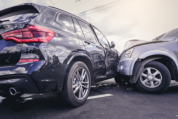 Two SUVs crash into each other.